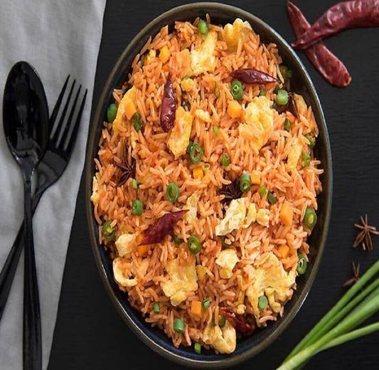 Schezwan Egg Fried Rice/Noodles